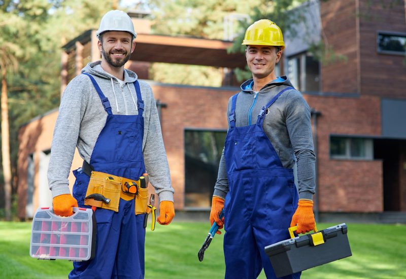 two-positive-handsome-young-male-engineers-in-hard-resize.jpg